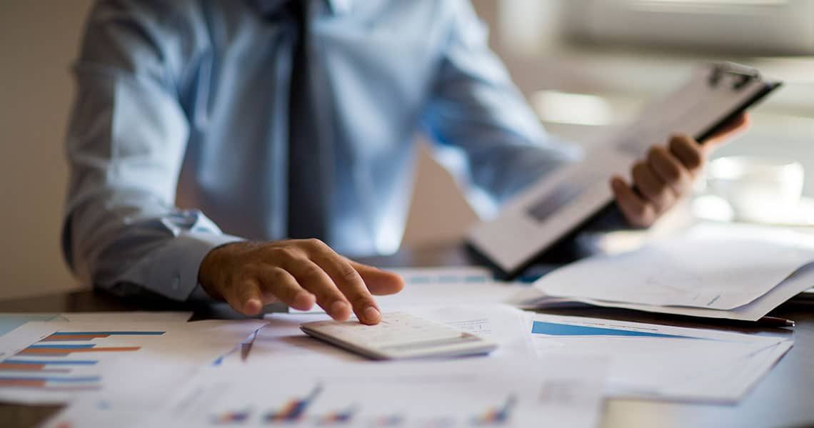 An accountant working on financial spreadsheets